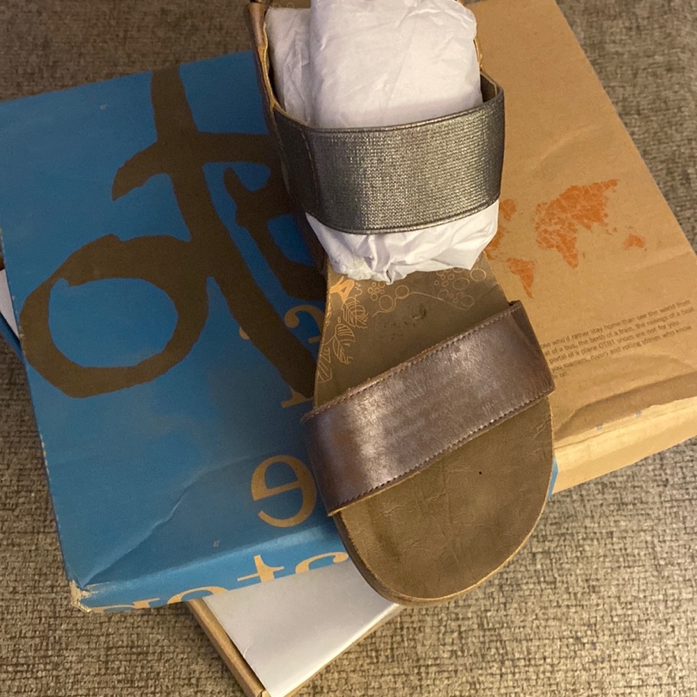 Brand new, never worn size 7.5 OTBT Bushnell Pewter.